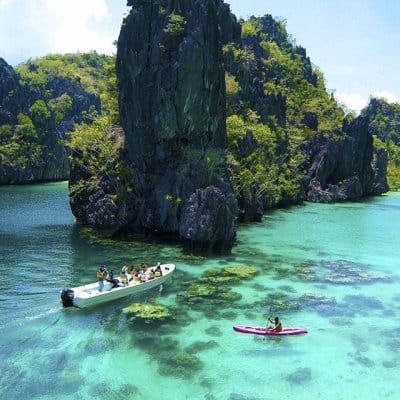 Island hop from El Nido to Coron in Palawan, Philippines and explore hundreds of untouched, paradise beach islands. Kitesurfing, snorkeling, diving.