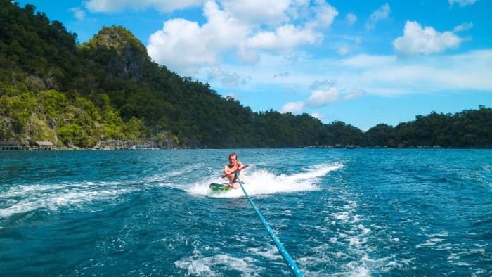 wakeboarding on a group boat tour between El Nido and Coron