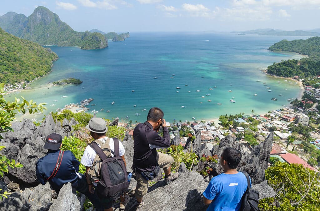 El Nido Palawan Philippines March 22 2014 A group of tourist at Taraw peak El Nido Palawan on March 22 2014. Taraw cliff is a limestone peak popular among tourist