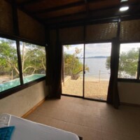 Panoramic view from the beachhouse overlooking the sea and surrounding nature.