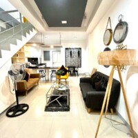 Modern living room at Hotel1 Princesa, featuring stylish furniture and contemporary decor.