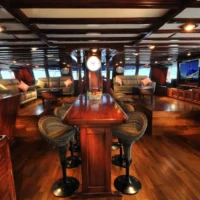 Interior view of the Siren Liveaboard cruise ship lounge area.