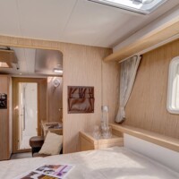 Cozy cabin interior on a Philippines island-hopping cruise.