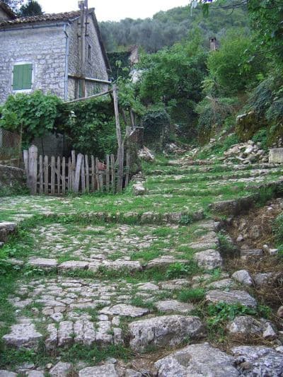 Cheap travel europe tour guide - monastery up hill above Stoliv, Montenegro