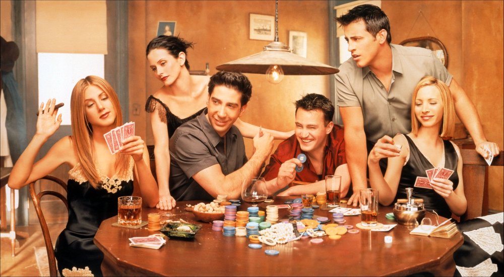 Friends playing rummy 500 card game